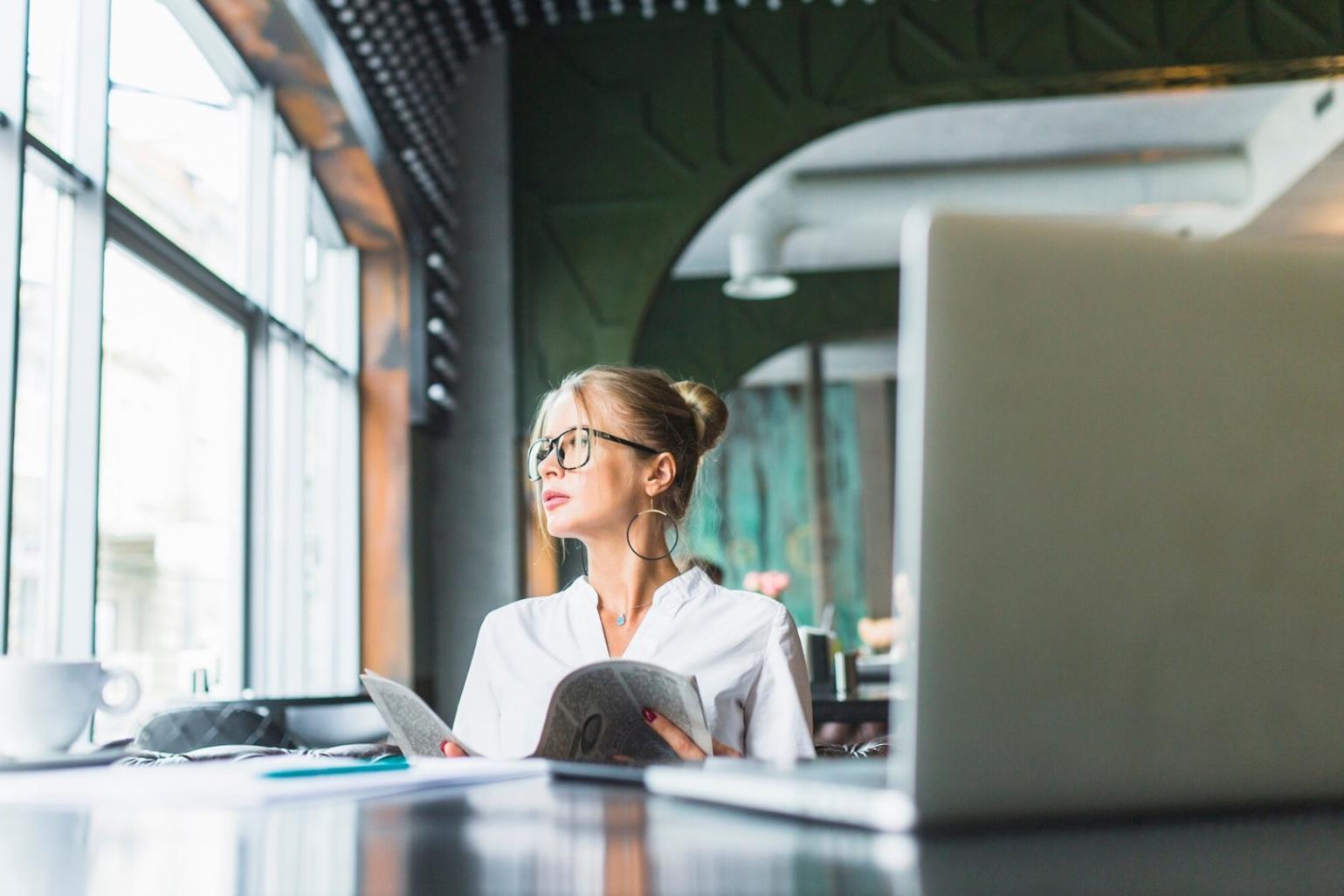 Financial planning meeting with laptop and reports